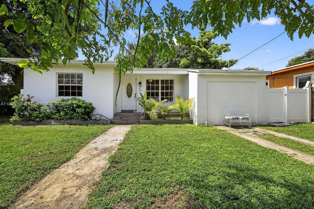 This 3 bed, 2 bath bungalow effortlessly blends classic Miami charm with modern updates.