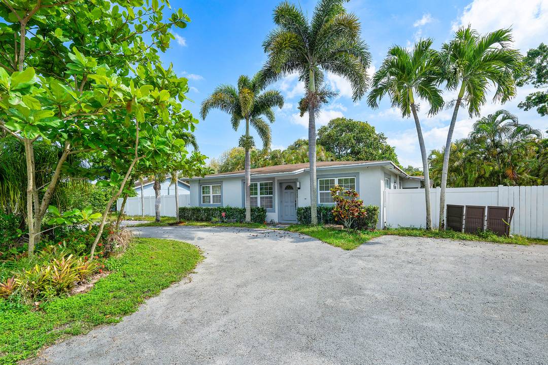 Welcome to this spacious 6 bedroom, 3 bath residence nestled on an oversized lot spanning over half an acre, one of the largest parcels in Margate.