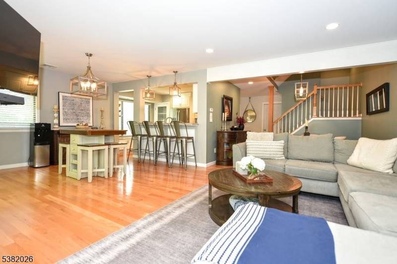 Discover this sun drenched END UNIT townhome offering peace and privacy in the sought after Spruce Run community.
