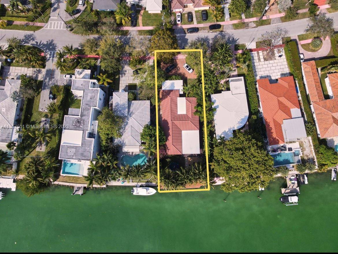 5 bedroom 3 1 2 Bath. Miami Beach Waterfront property located in the sought after gated community in Normandy Isle.