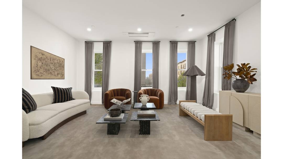 Park Slope living is beautifully realized in this expansive four bedroom, three bathroom floor through condominium offering exceptional light, refined finishes and private outdoor space.