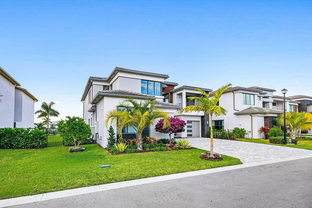 Welcome to this exceptional Laguna residence in the sought after community of Lotus Palms, perfectly positioned on a premium lake lot at the end of a quiet cul de sac.