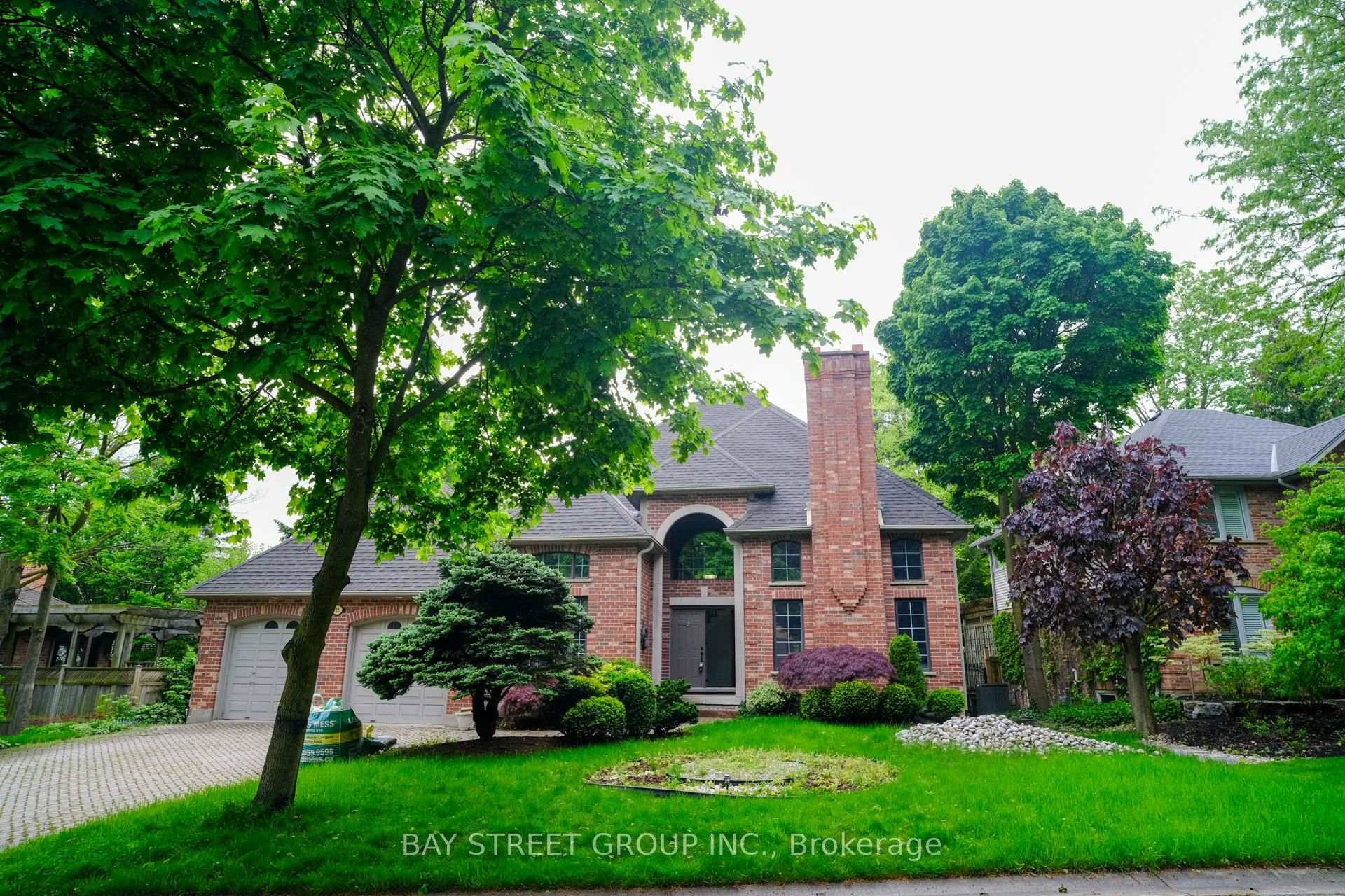Stunning executive beautiful red brick family home on a Premium treed lot in Masonville neighbourhood.