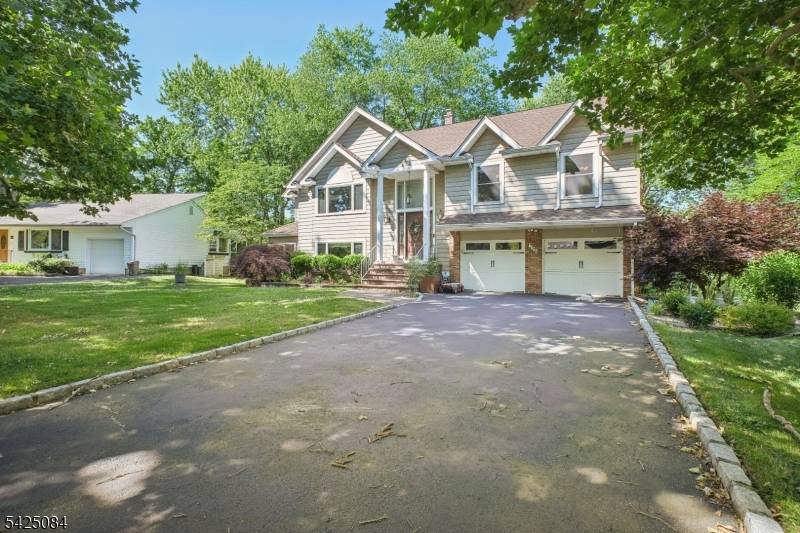 This fully renovated home features 4 bedrooms, 2 full bathrooms, and 1 half bathroom.