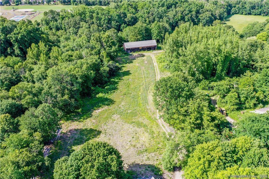 24 acres of prime land nestled along the banks of the Scantic River.
