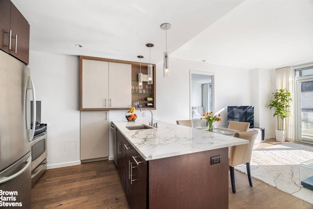 Two Bedroom Condo with Private Outdoor Space Close to Central Park Apartment 6J is a beautifully modern two bedroom residence located at 350 West 53rd Street.