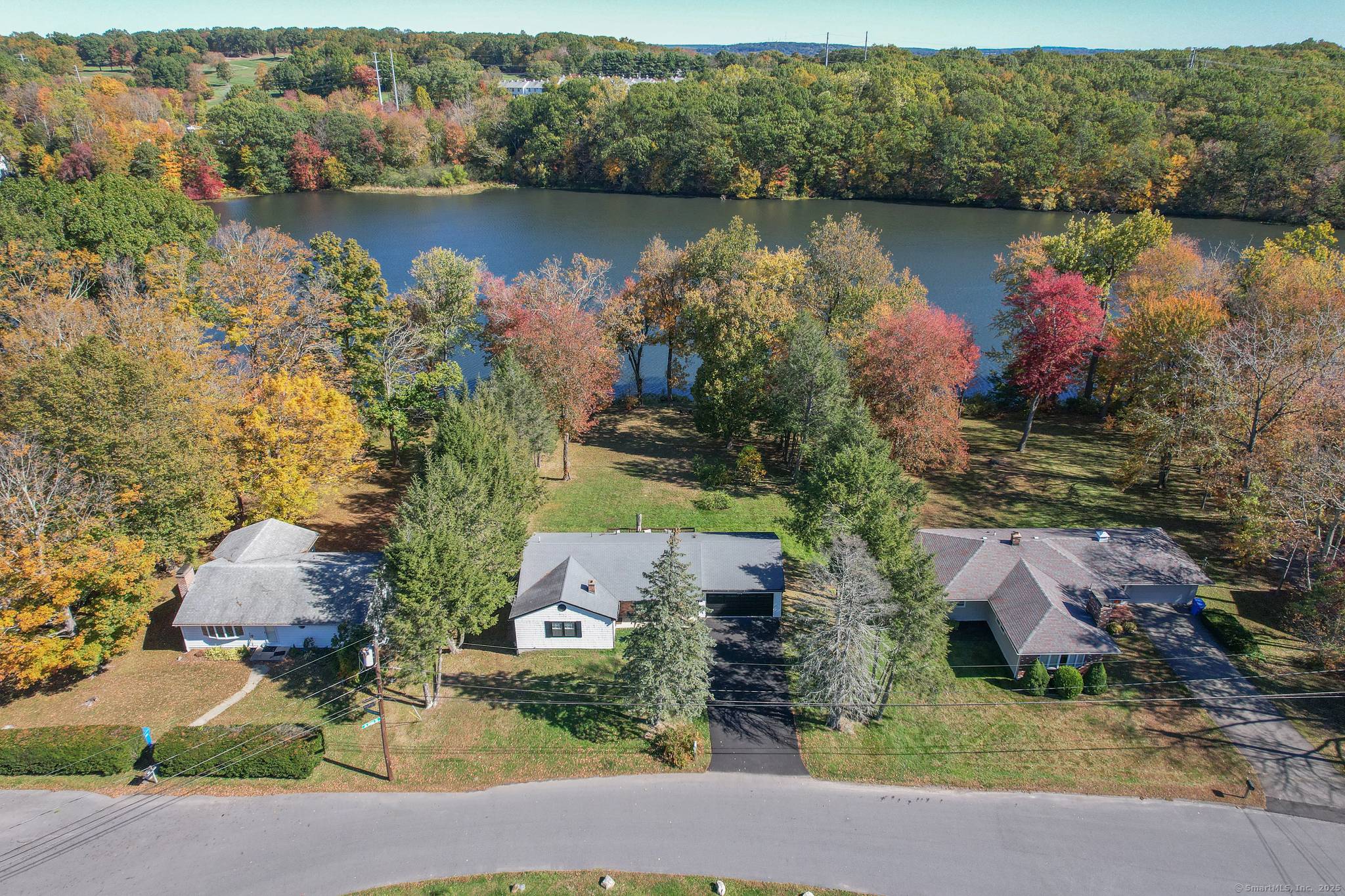 Enjoy the perfect blend of comfort and style in this stunning four bedroom Ranch home, perfectly set on a large, flat lot with SWEEPING WATER VIEWS.