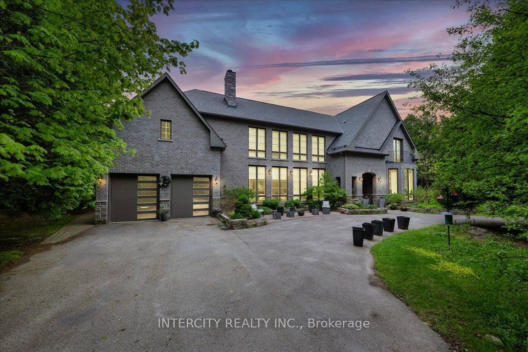 Built in 2018 Custom Home on a Rare 50 Acre Parcel of Land with 1311 ft Frontage on Cul de Sac Street.