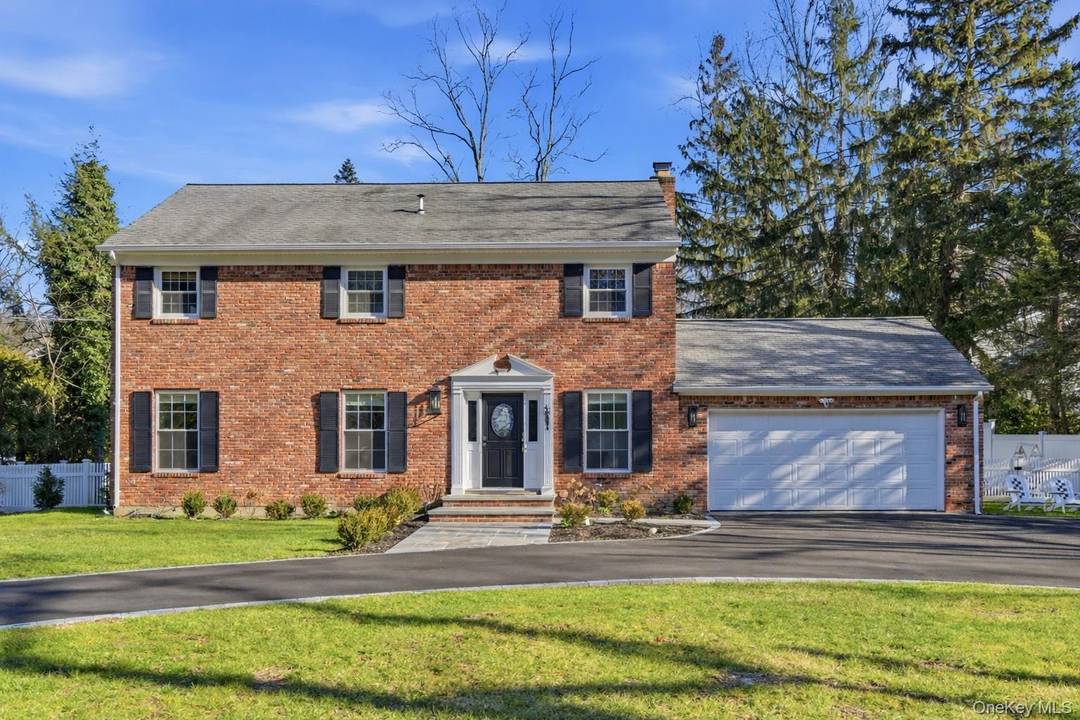 This classic center hall 4 bedroom Colonial is nestled in the highly desirable Cold Spring Harbor midland community.