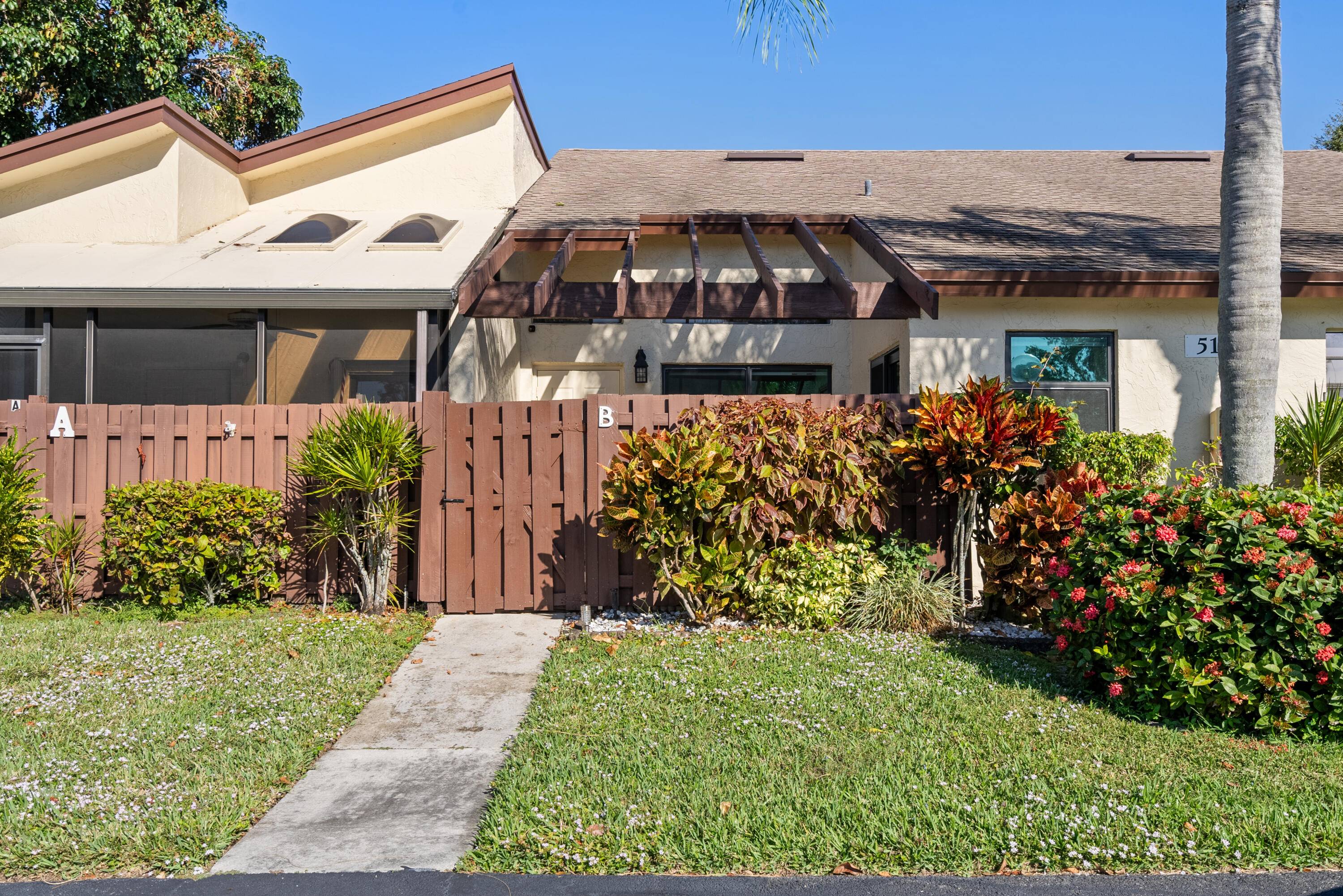 This immaculate villa in a sought after 55 community features a versatile OPEN LOFT AS SECOND BEDROOM, office, or guest space.