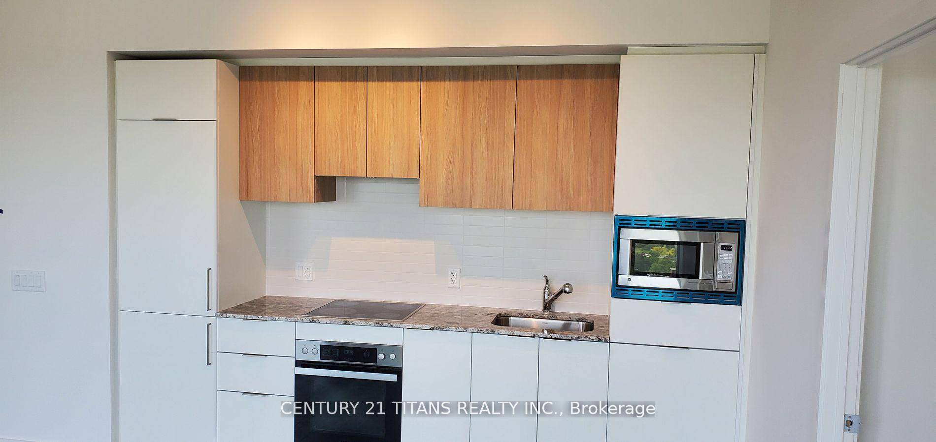 2 Brs Den, 2 Wrs North East Corner Unit With One Parking, 9' Feet Ceiling, Bright amp ; Spacious.