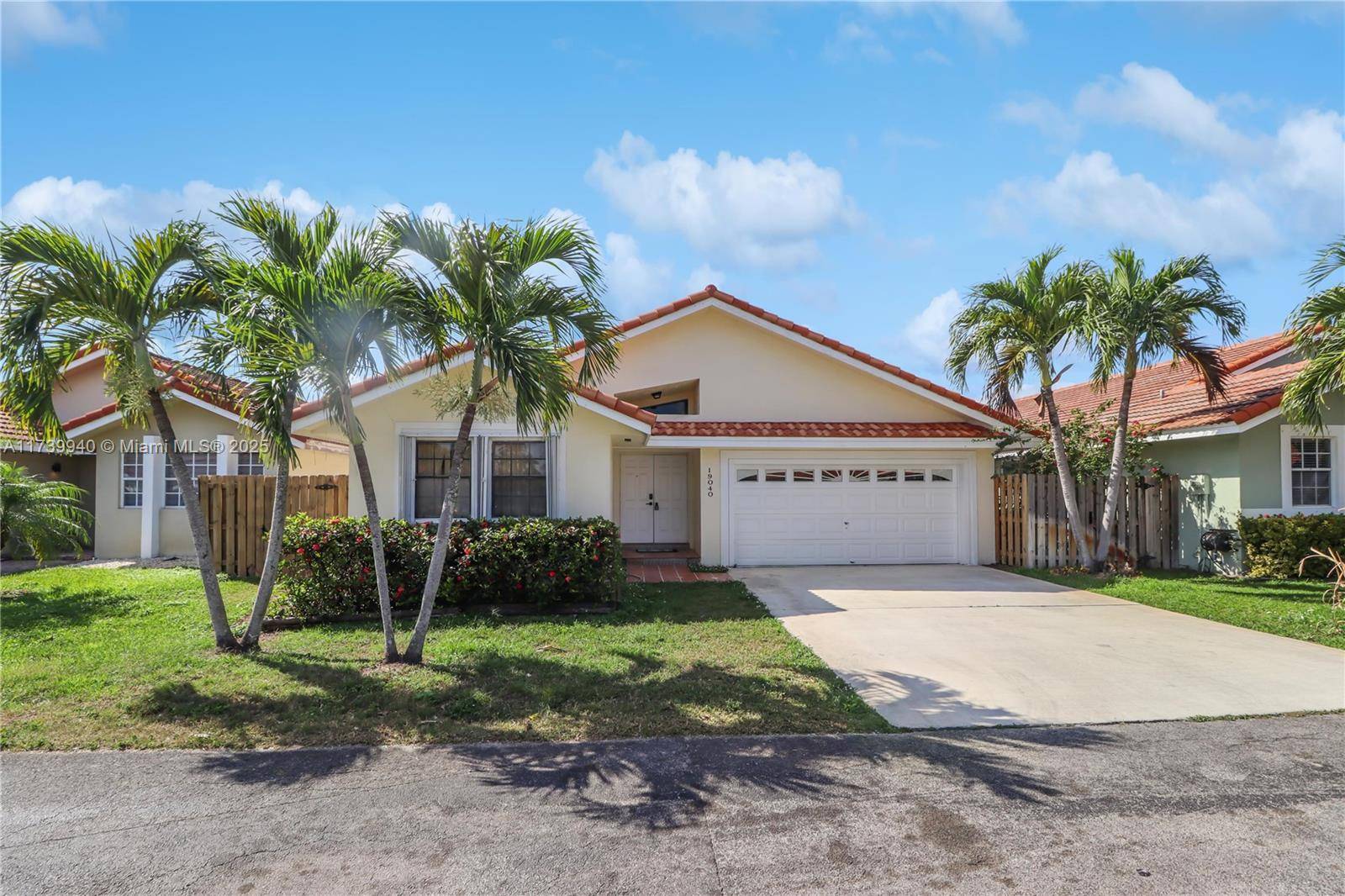 Nestled in the serene Angelica Gardens community, this beautiful home offers high ceilings, a split bedroom layout, and recessed lighting.