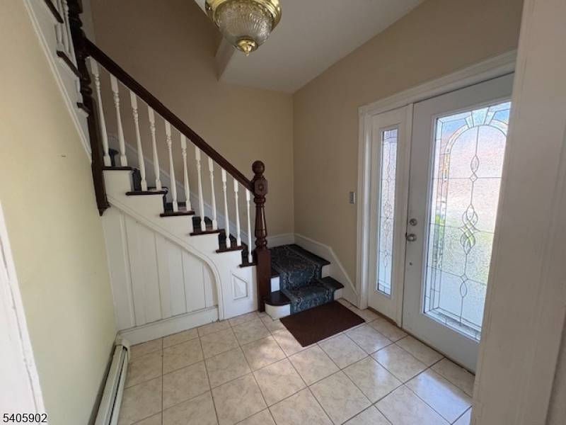 Well maintained two family residence offering spacious, well appointed layouts in each unit.