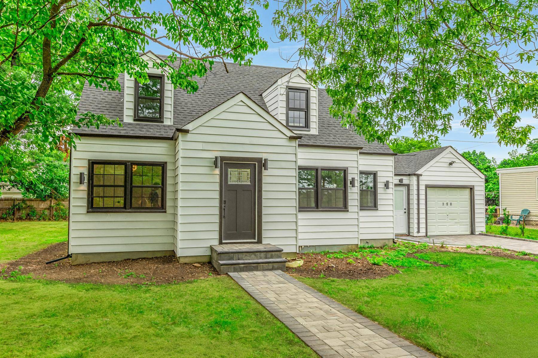 Move Right in to this Completely Renovated Home in The Heart of Carle Place.