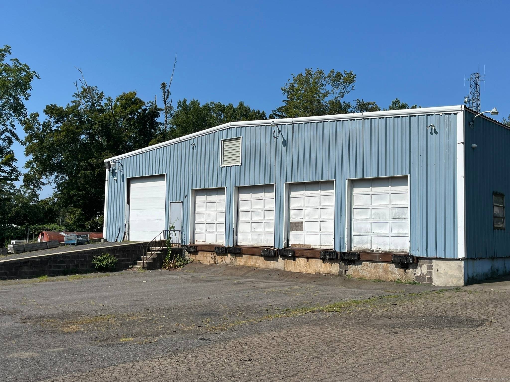 4, 830 sq. ft. industrial building, previously used for truck parking.