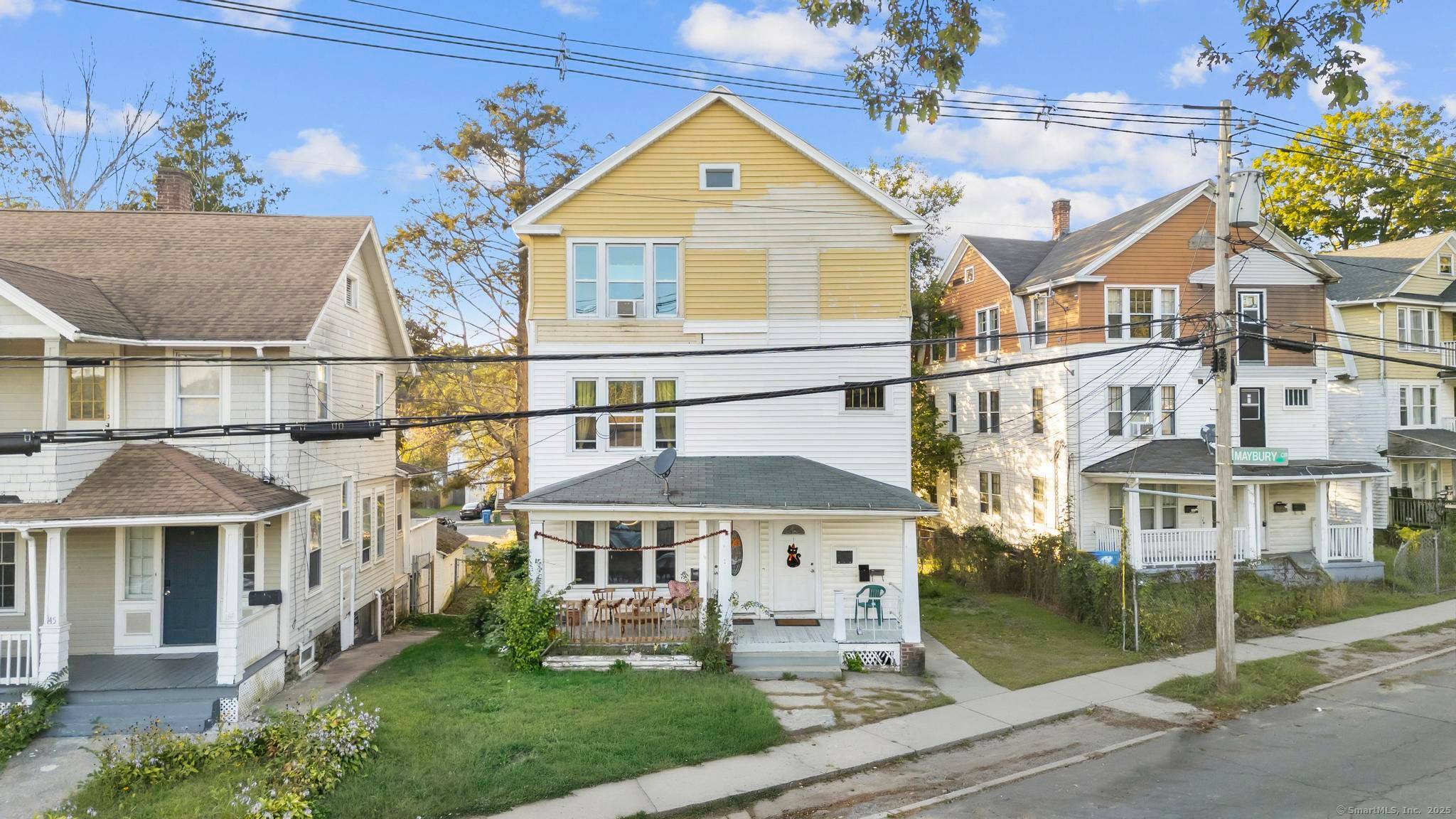 Owner occupy or invest in this spacious 3 family in Waterbury's desirable East End, offering immediate cash flow.