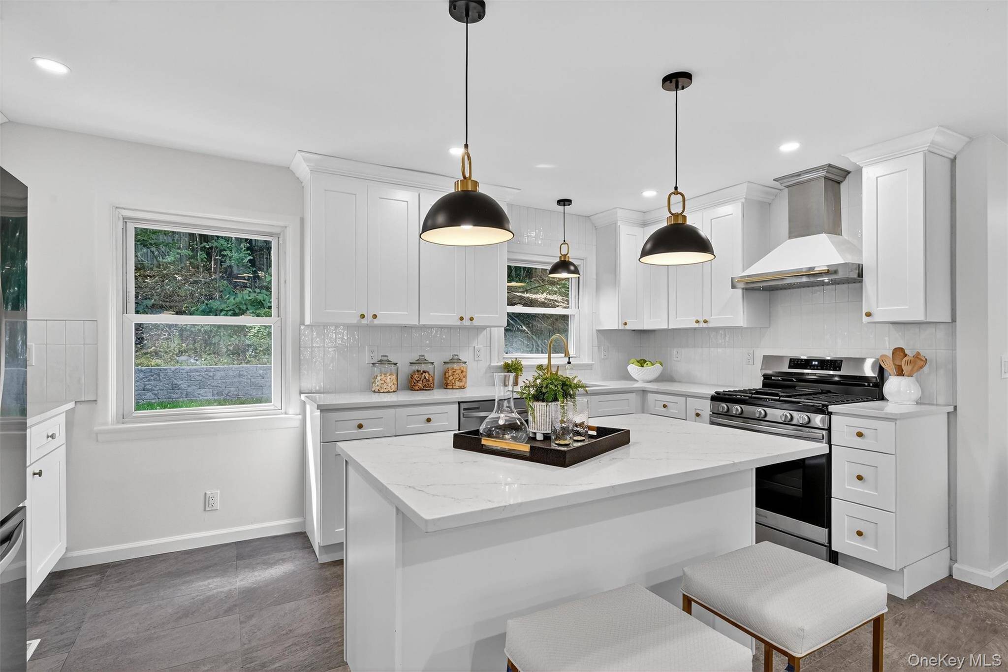 Welcome to this exquisitely renovated four bedroom, two bath unit in a Nyack duplex where timeless charm meets modern sophistication.