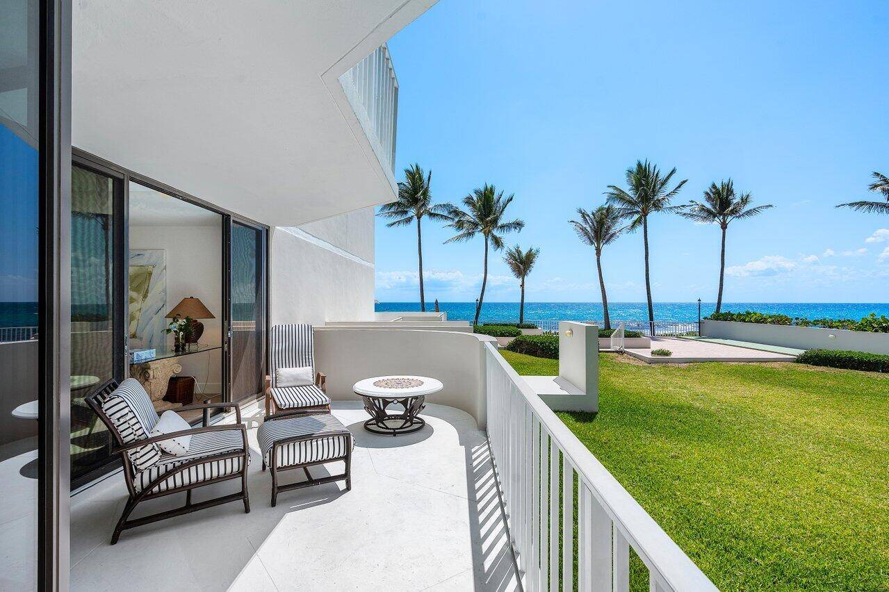 Experience coastal luxury at its finest in this beautifully updated 2 bed, 2 bath first floor walk out condo at dog friendly Trafalgar of Highland Beach.