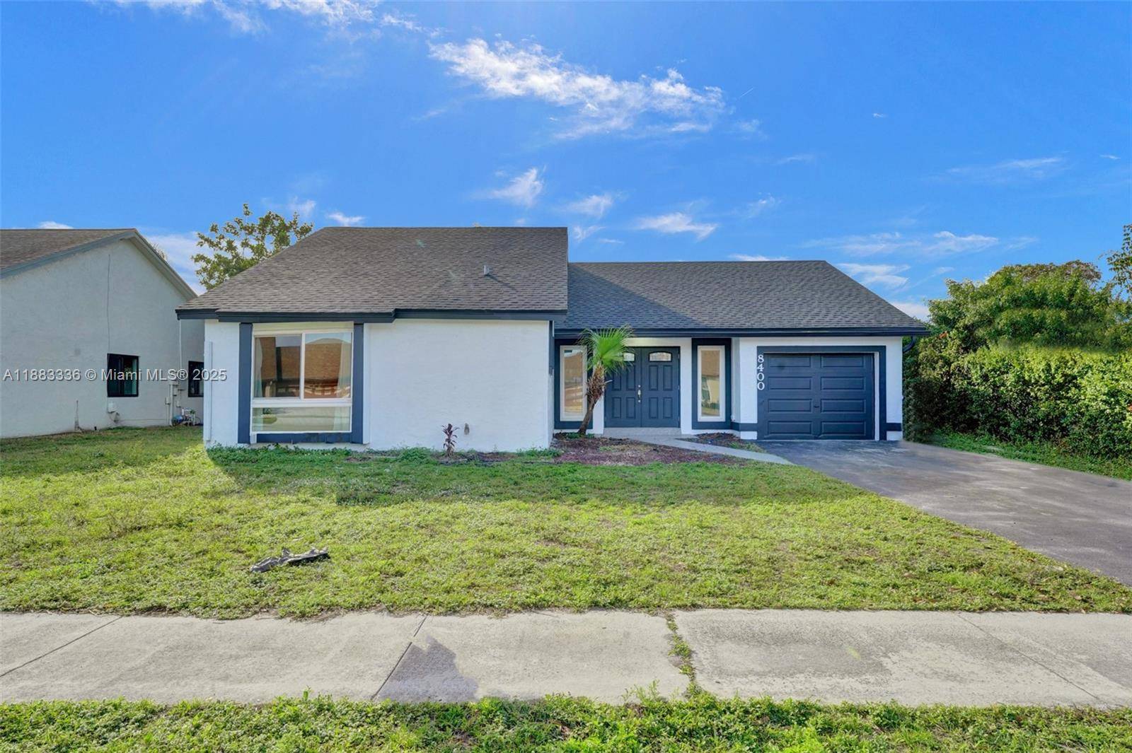 Stunning renovated 3 bed 2 bath pool home perfectly situated on a serene lakefront on a quiet Pembroke Pines street.