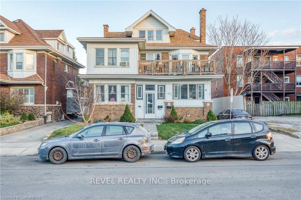 LEGAL non conforming triplex situated on a quiet boulevard in the Hamilton downtown core.