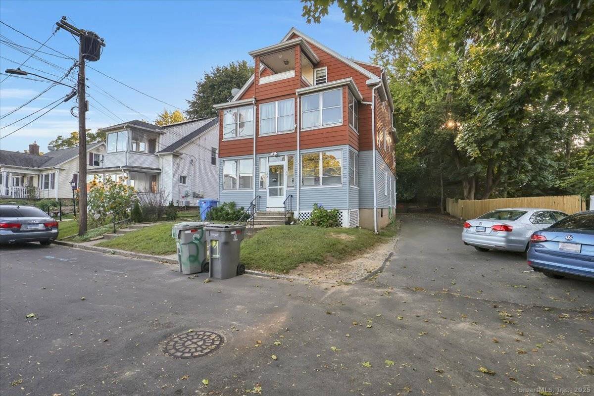 Discover an excellent investment opportunity at 33 Emory Court, Bristol, a well maintained 3 family located on a desirable end lot with ample parking.