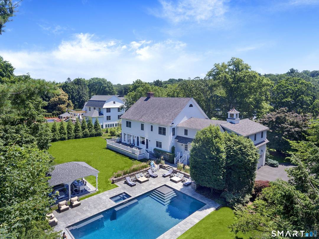 This pristine Colonial offers timeless Westport elegance and effortless living, set on 1.