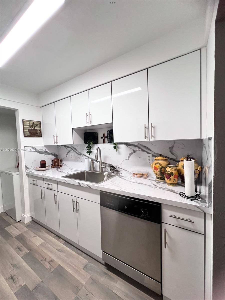 This charming 3 bedroom 1 bathroom gem is an entertainer's paradise.