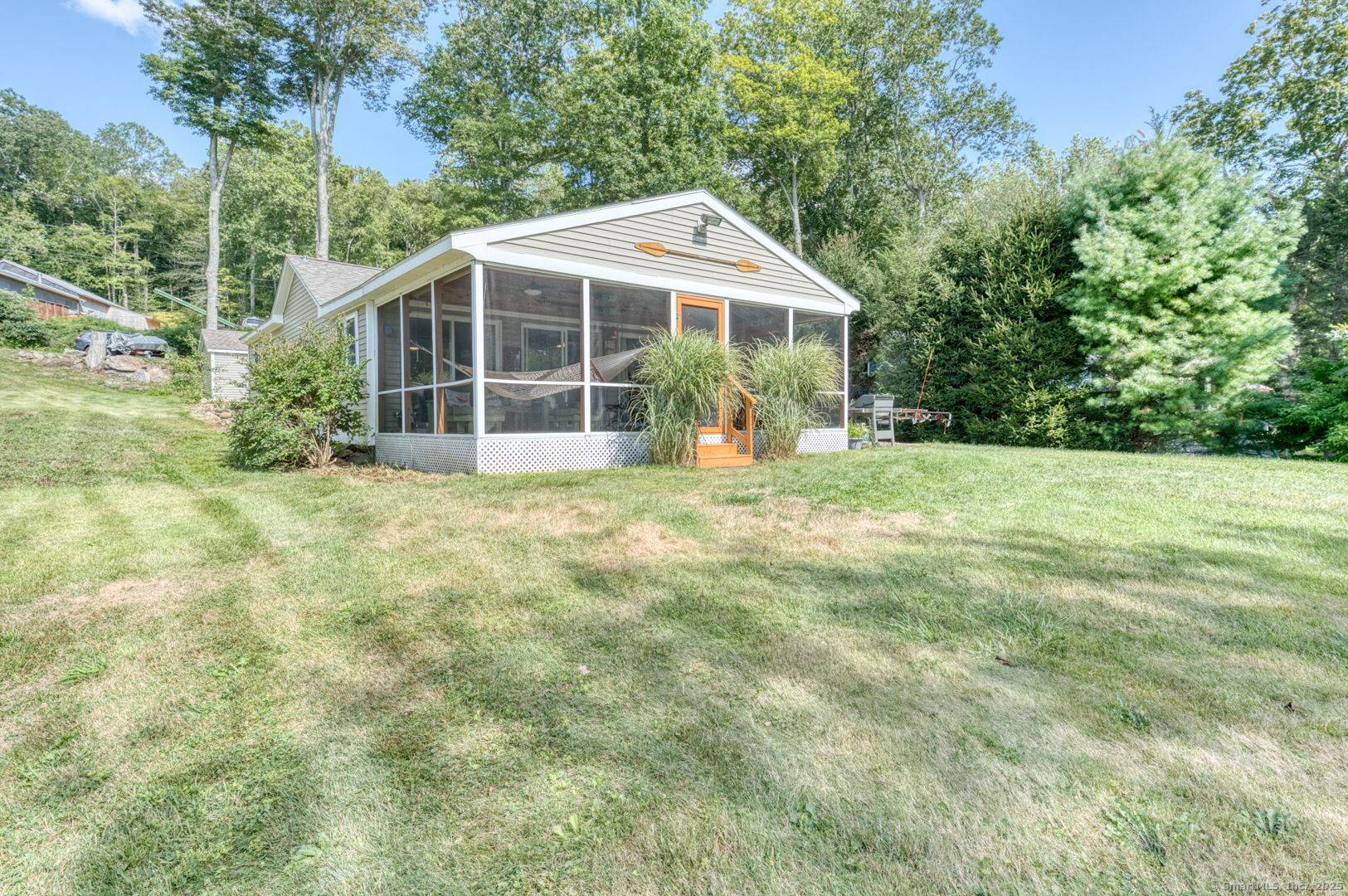 Water views define this tranquil lakeside retreat.