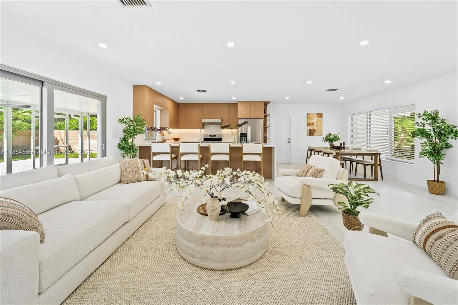 Welcome to 6320 SW 62nd Terrace, a designer 4 bedroom, 3 bath, 2402 total S.
