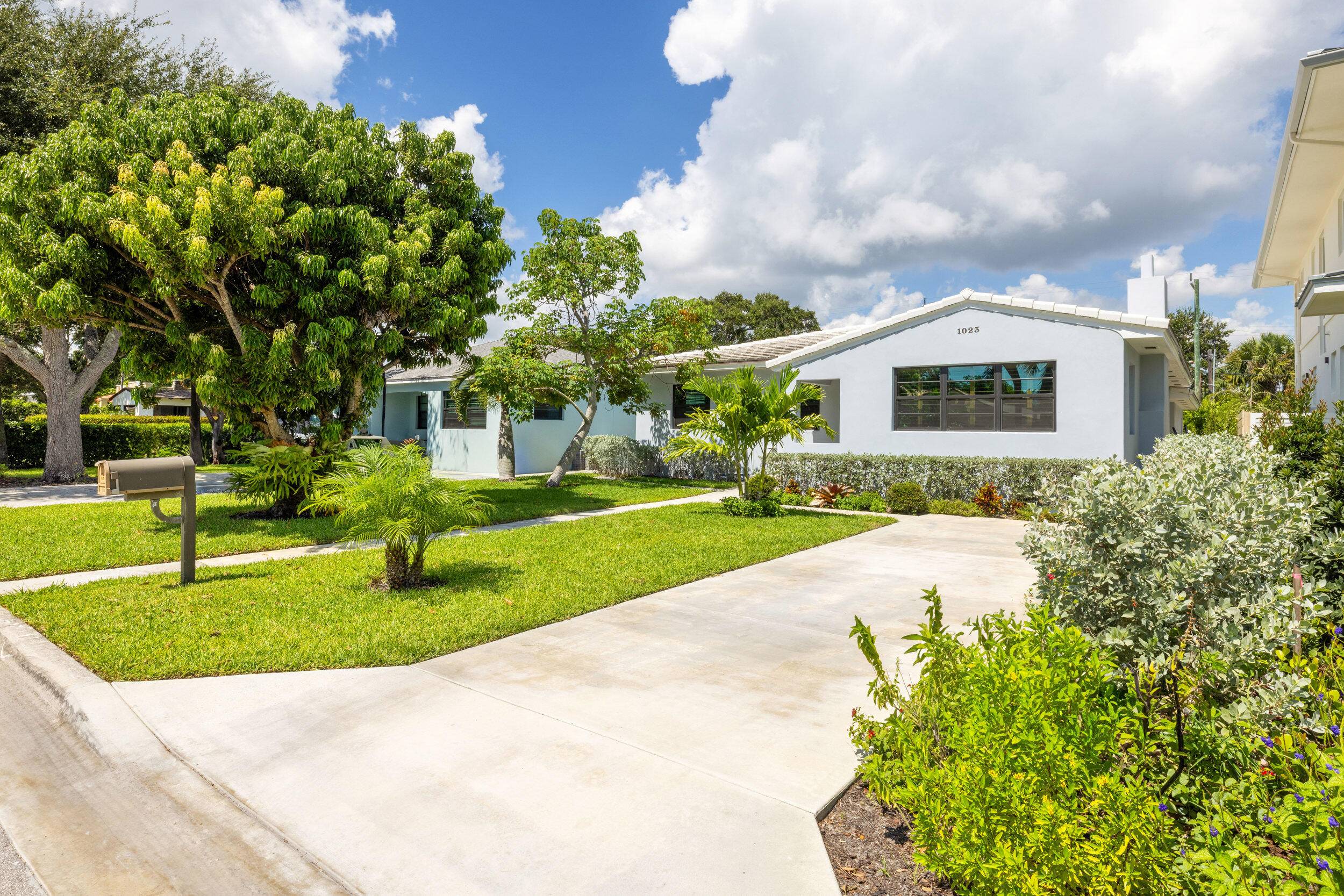 Enjoy the best of coastal living just two blocks from the Intracoastal in this beautifully updated 4BR 2.