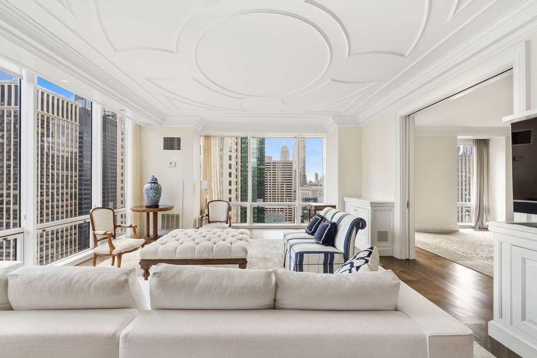 XXX MINT HI FLOOR CORNER FURNISHED TWO BEDROOM TWO AND A HALF BATH HOME in the world renowned Olympic Tower.