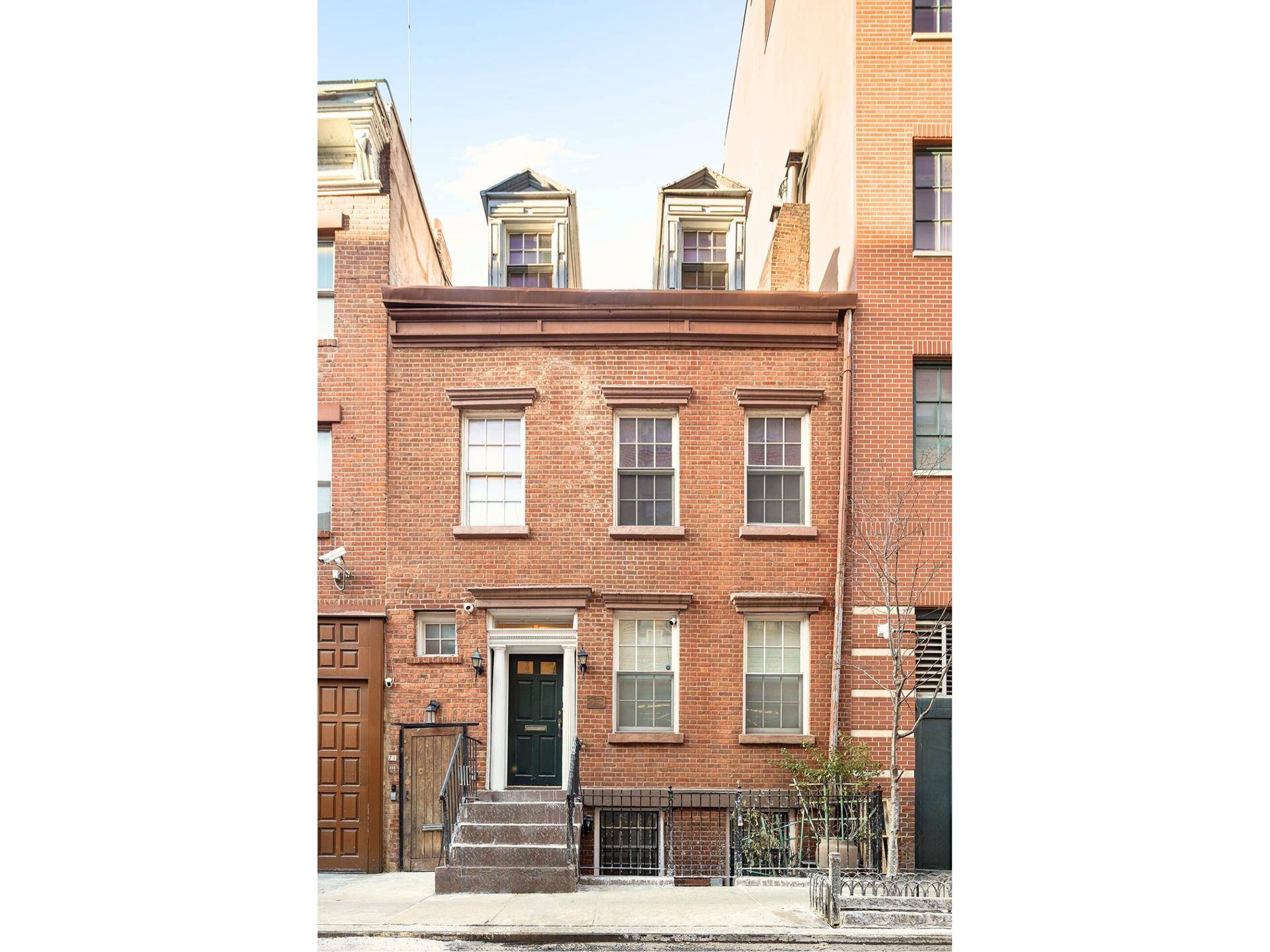 Step into history with this beautifully preserved Federal style townhome at 7 Leroy Street, a rare gem glistening with tradition and charm.