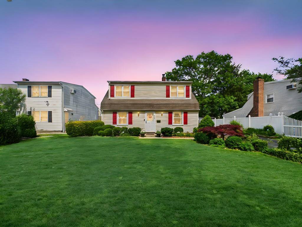 Charming Cape style home featuring 4 bedrooms and 1 updated bathroom, situated on an oversized lot in a prime Levittown location.