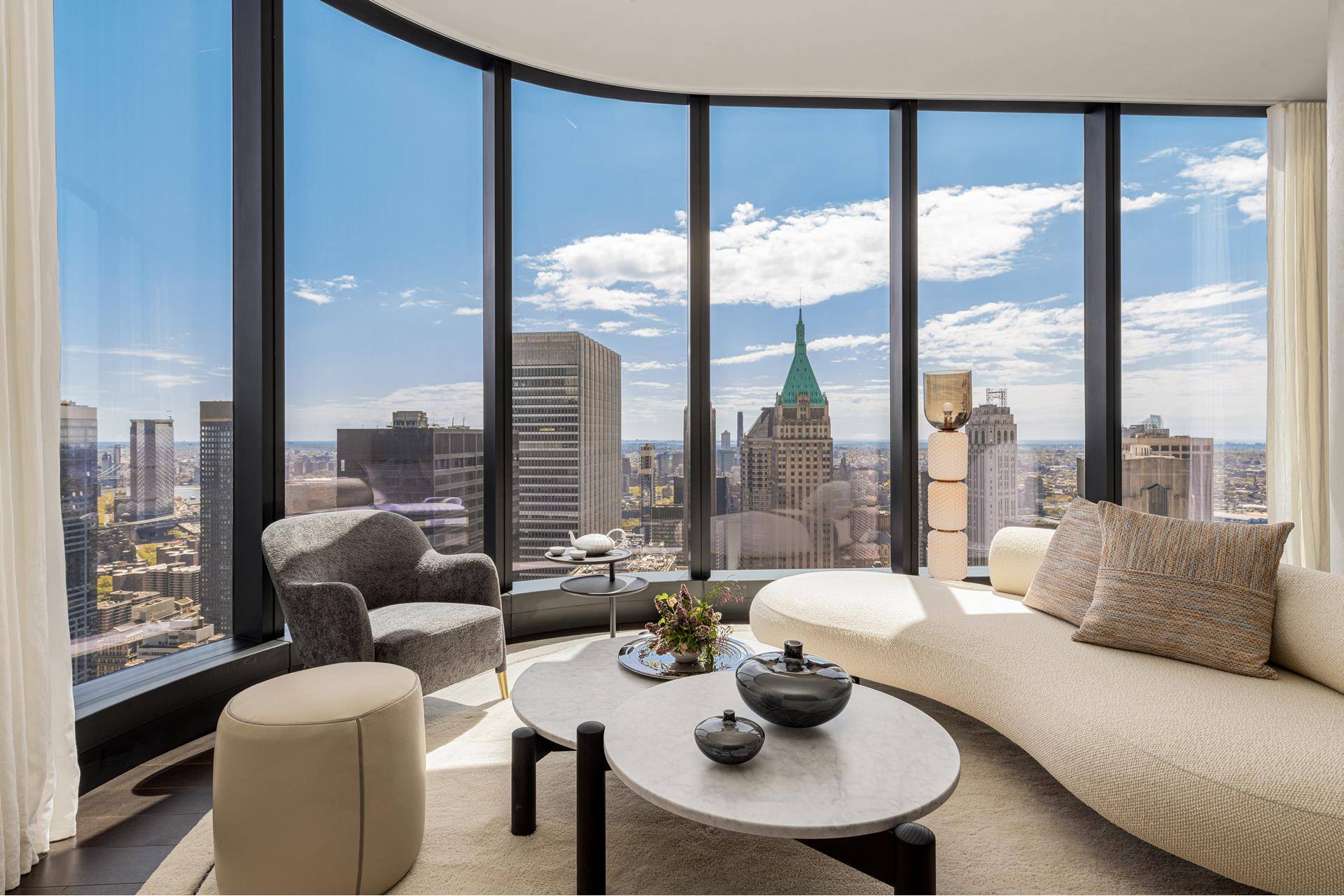 Introducing Residence 71A at The Greenwich by Rafael Vi oly, a north and east facing one bedroom, showcasing sweeping panoramas of the Manhattan Skyline and the East River.