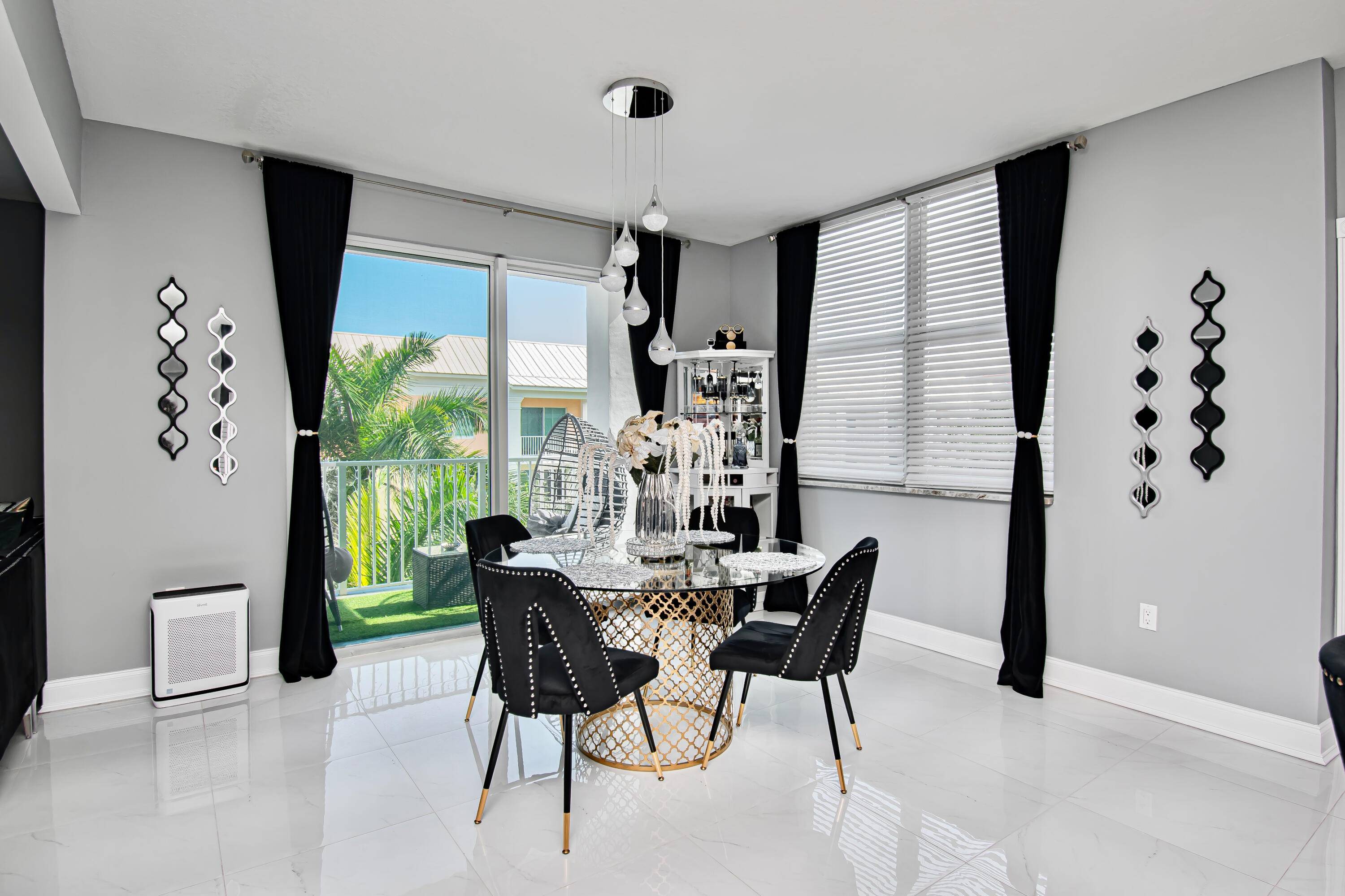 WOW ! ! Meticulously manicured with lush landscape as you enter The Moorings at Lantana !