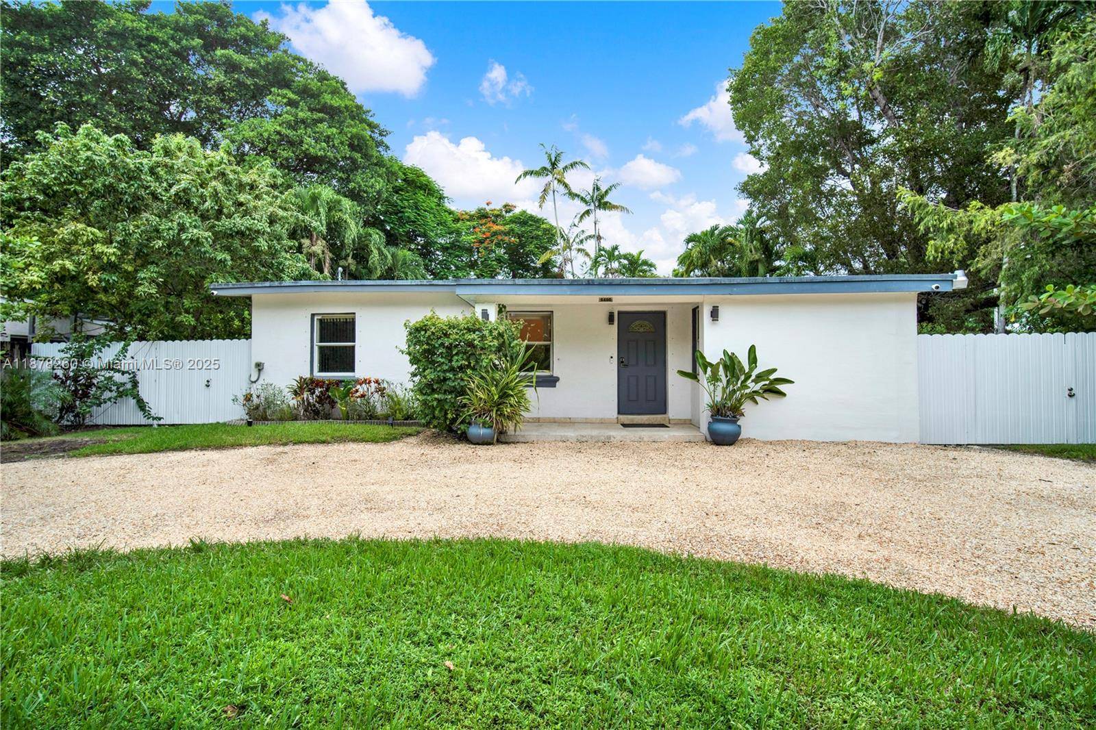 Discover refined living in this updated 3 bedroom, 2 bath home set on a 1 4 acre corner lot in the heart of South Miami.