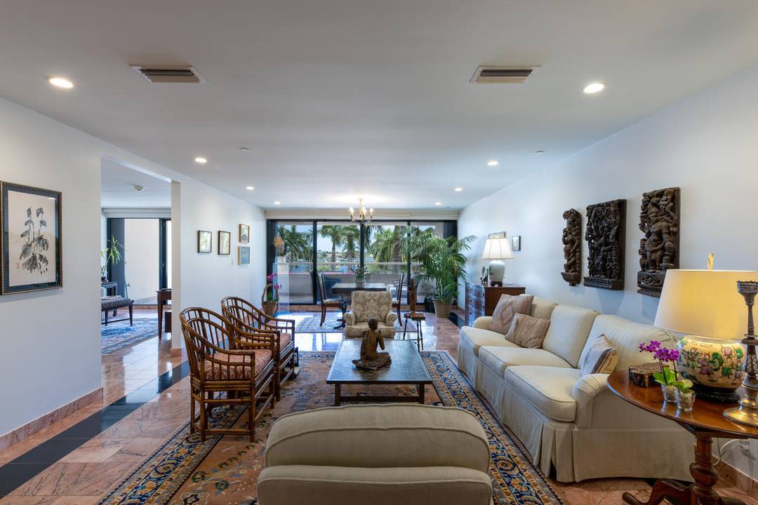 Lovely water views from this elegantly updated one story townhouse with over 3, 325 total sq.