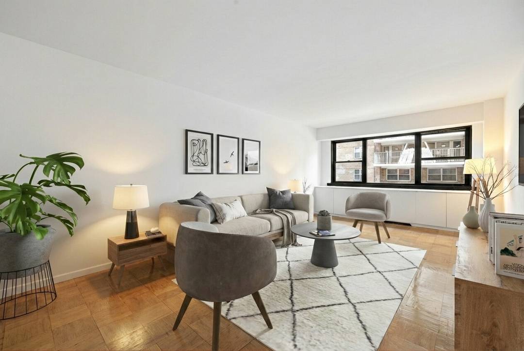 Welcome to this spacious one bedroom residence in a full service Upper East Side cooperative, offering exceptional quiet and comfort.