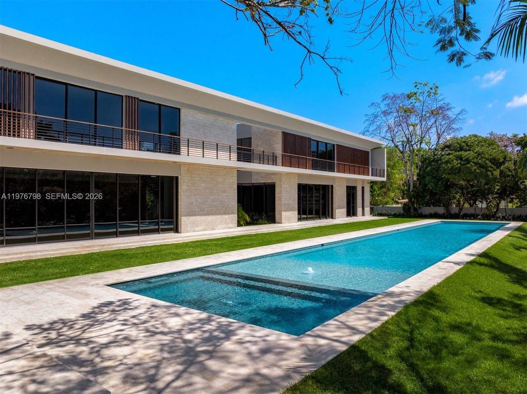 Step into Villa Straordinaria, a modern masterpiece set on a lush 1 Acre lot in coveted Ponce Davis.