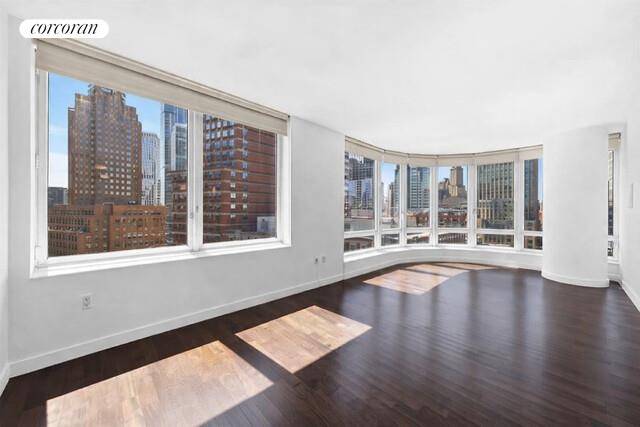 Spacious and exceptionally bright corner one bedroom, one bath condominium at The Oro Condominiums.