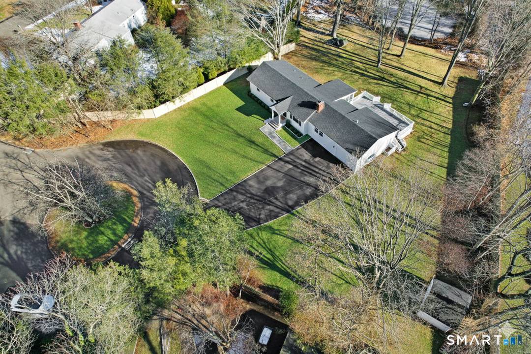 Nestled at the end of a cul de sac in Rowayton, Norwalk's beloved coastal village, this beautifully renovated ranch offers easy, turnkey living with room to spread out.