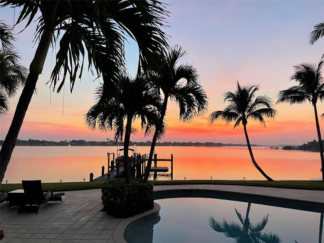 Stunning seasonal rental on the widest section of the Loxahatchee River with unobstructed water views all the way to the Jupiter Lighthouse.