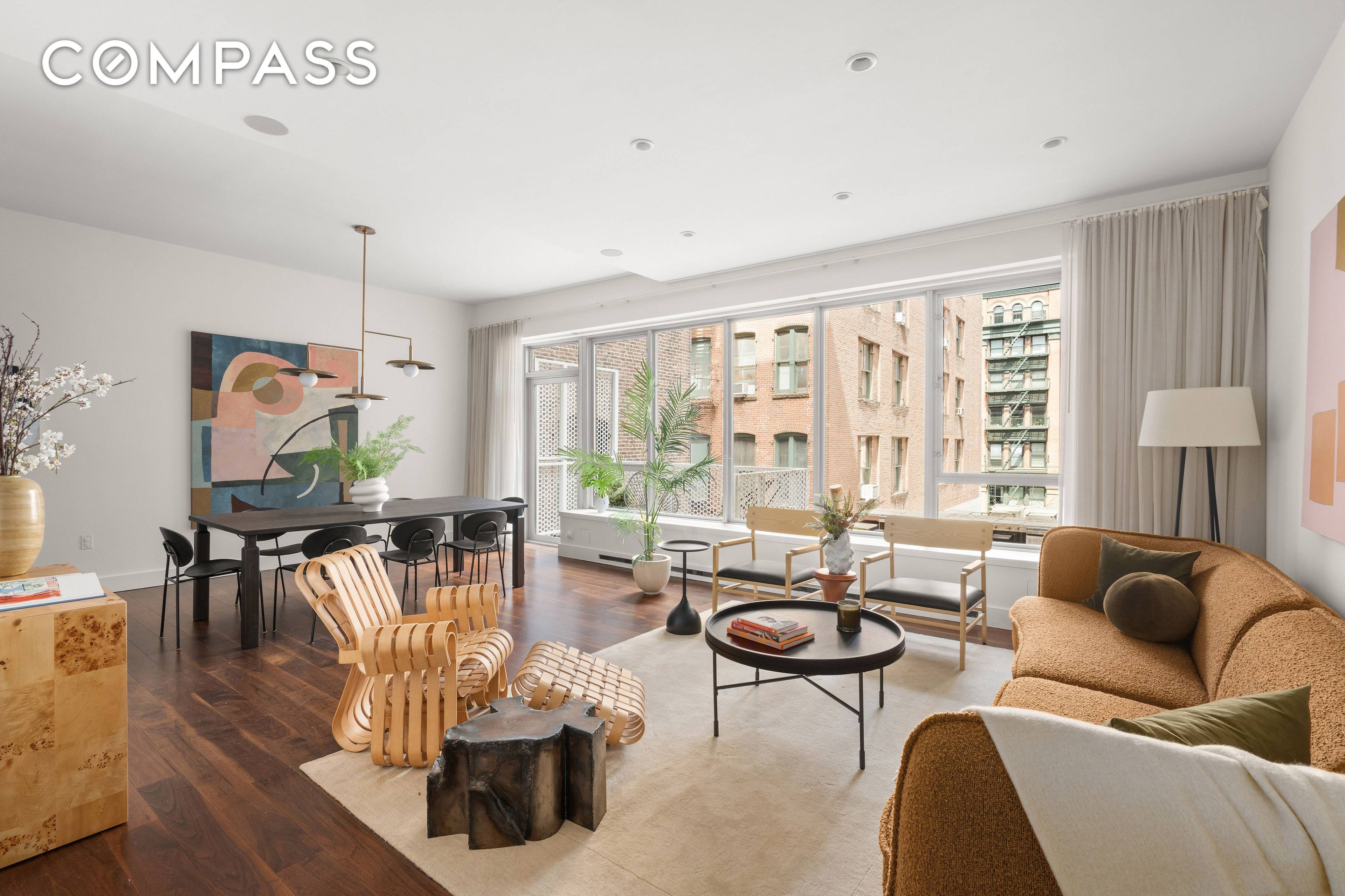 An expansive two bedroom, two bathroom residence with a terrace offering refined living in a boutique, amenity rich condominium on the city's most coveted cobblestone block Bond Street.