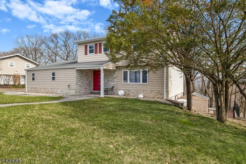 At the top of the Mountain Charming Colonial Home, surrounded by great view this home features on the main floor features a formal dining room, open concept to a huge ...