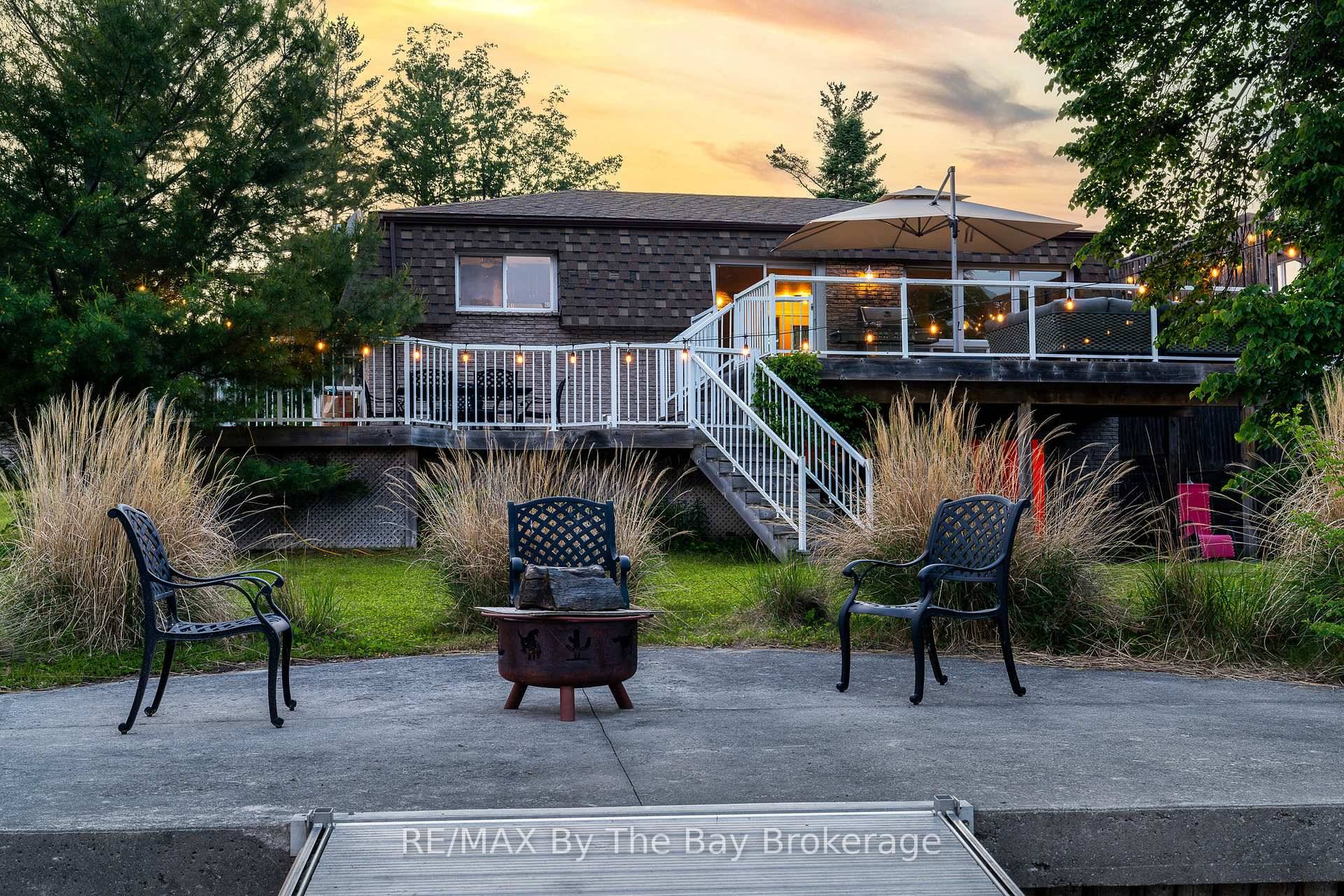 Waterfront retreat that offers year round living on the prime boating part of the Nottawasaga River in Wasaga Beach a convenient short walk to the pristine sandy shores of beautiful ...