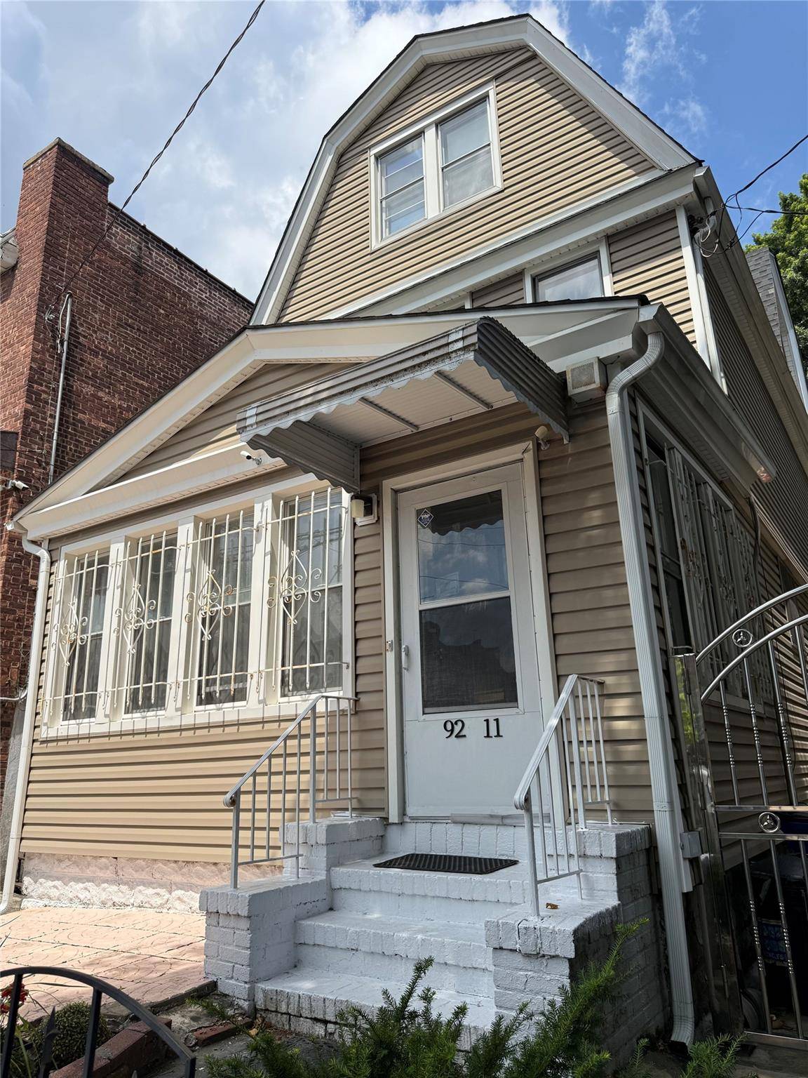 Welcome to this spacious single family home located in the heart of Elmhurst.