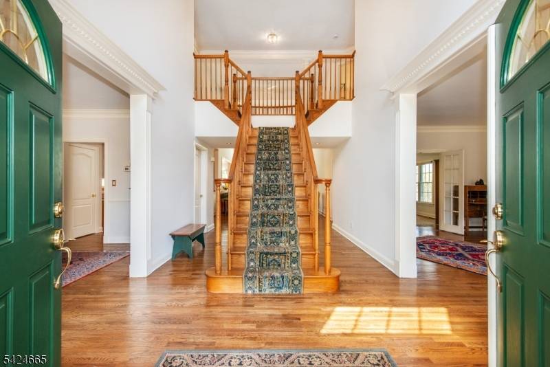 Overlooking the NJ National Golf Course, this exquisite 5 BR, 3.