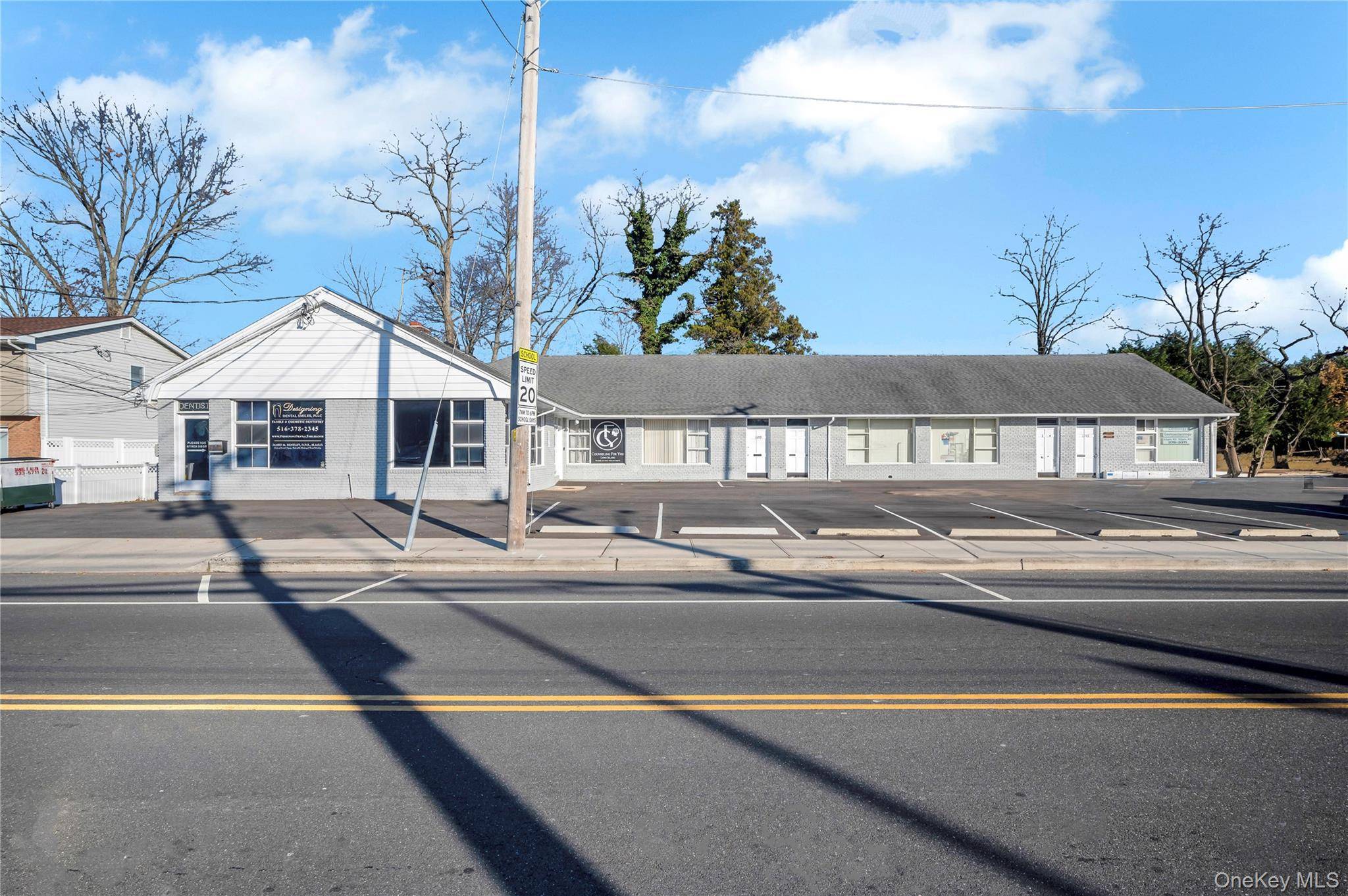 Welcome to this newly renovated, first floor professional office space in a charming brick building located in the heart of North Merrick !