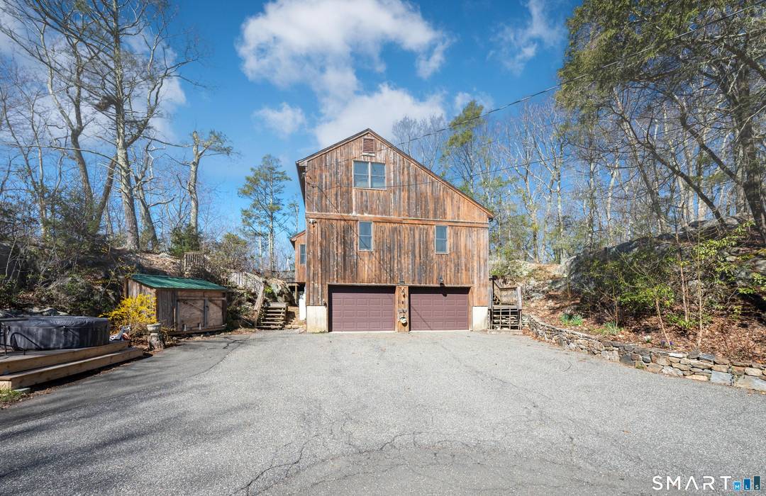This is a must see contemporary home nestled at the top of Spruce Mountain !