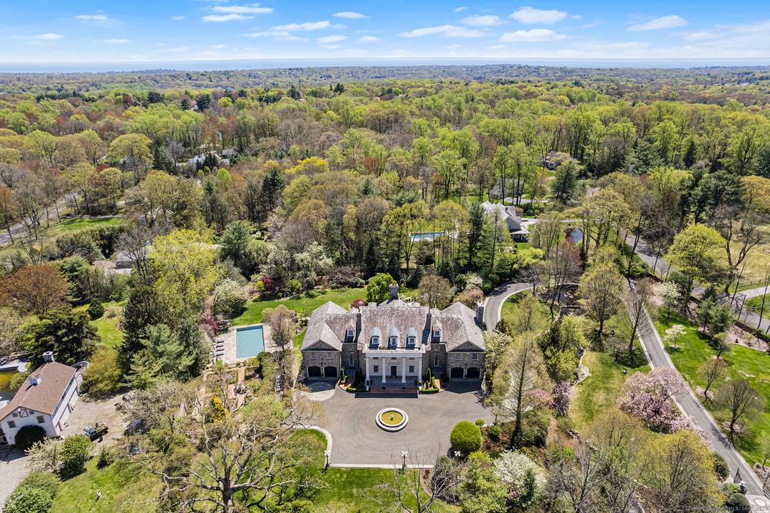 Prepare to be wowed by this extraordinary estate featuring six bedrooms and ten and a half bathrooms, spanning four meticulously designed floors.